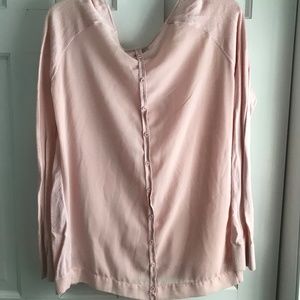 Light pink sweater with cool back